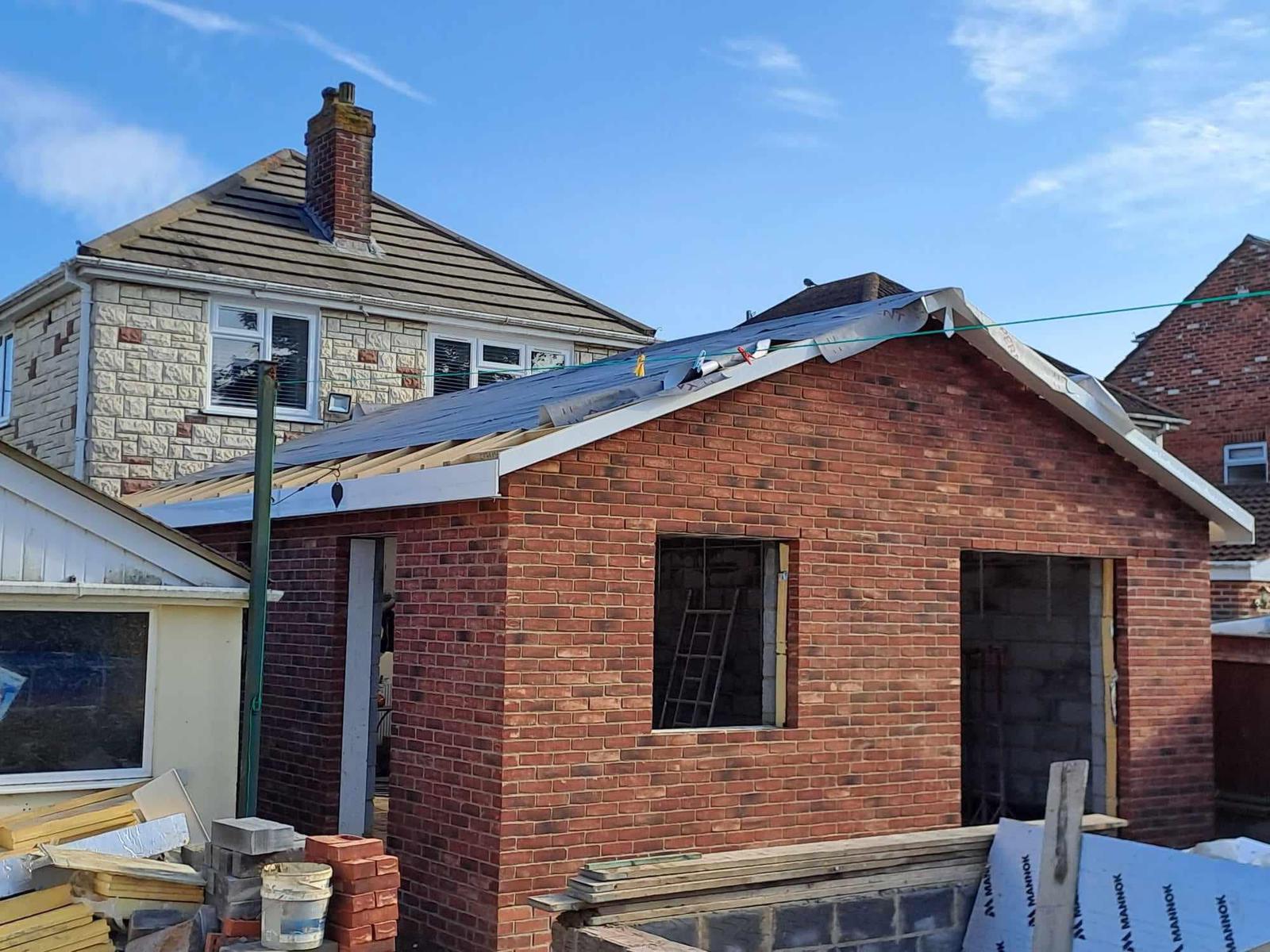 New pitched garage roof structure