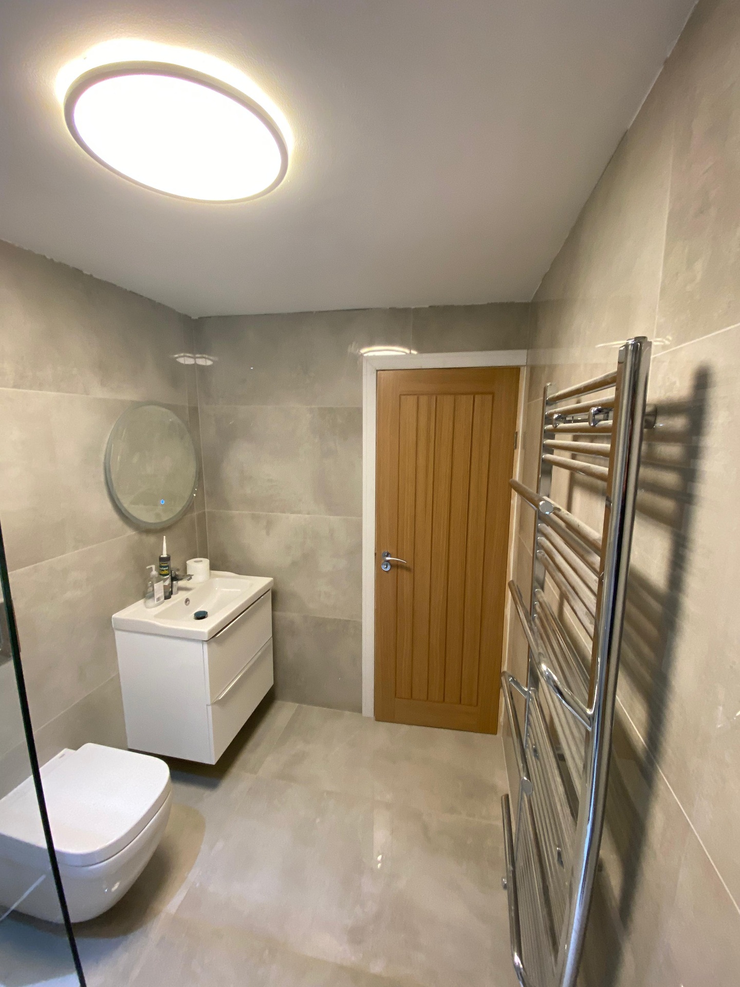 Grey stone-tiled ensuite