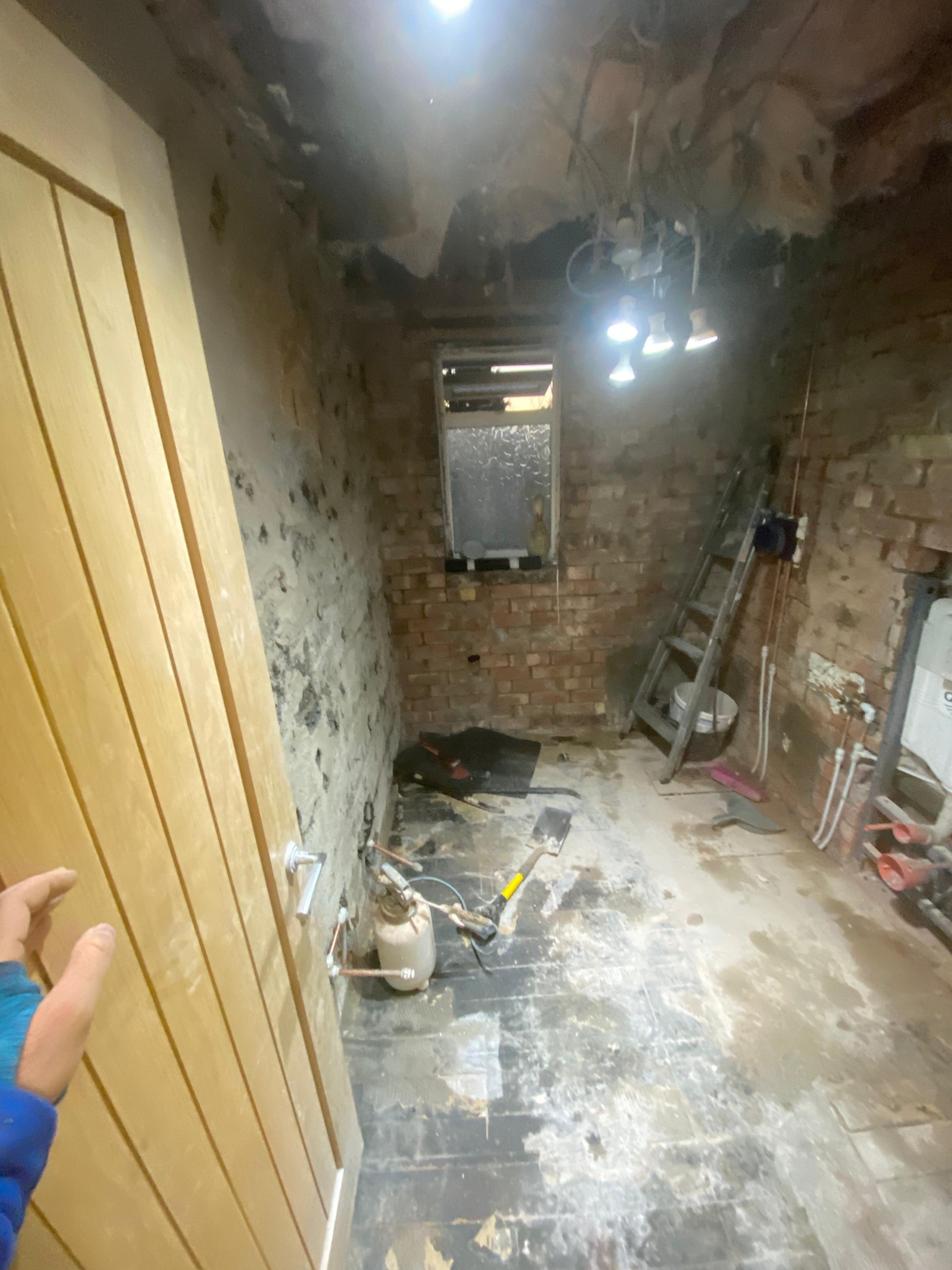 Beige stone-tiled bathroom — completed