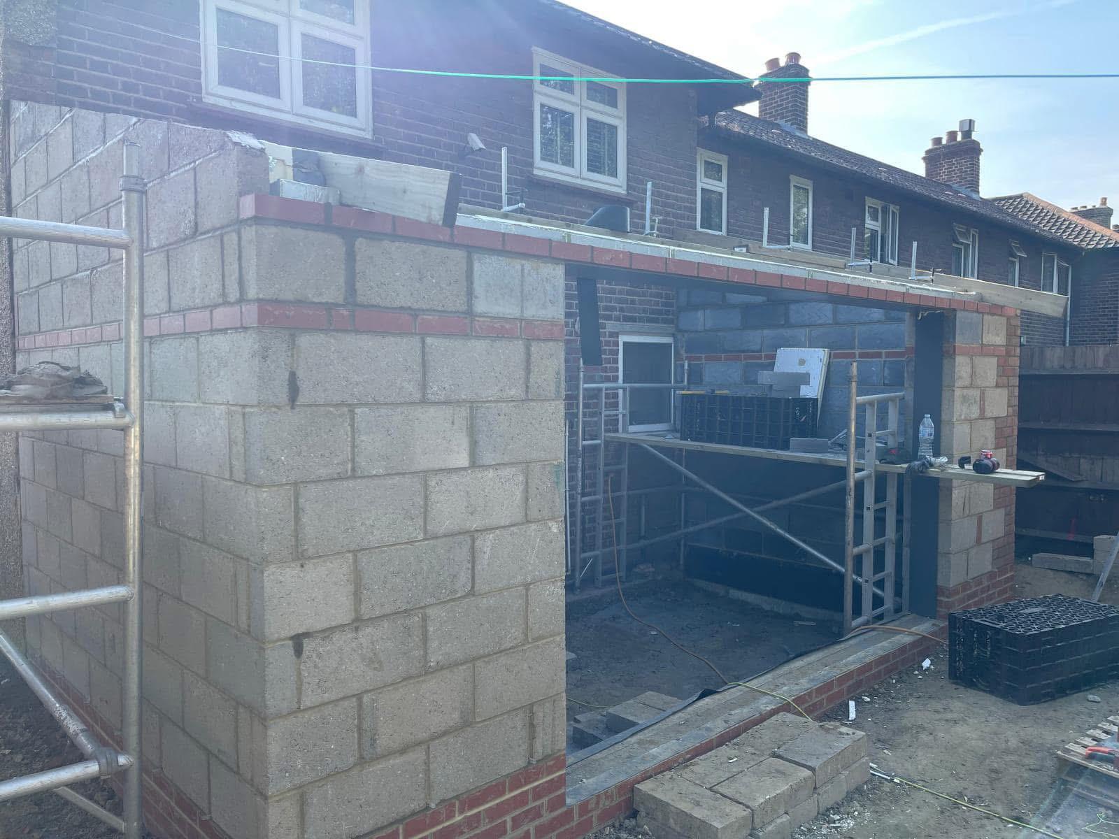 Two-storey extension shell — brick & block