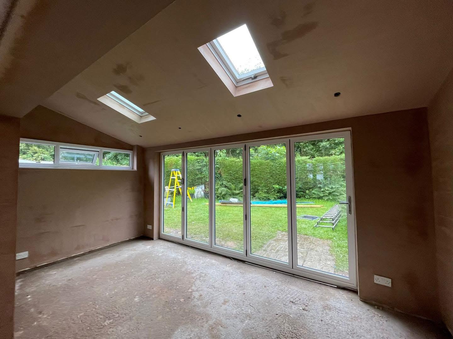 Plastered garden room with bi-folds