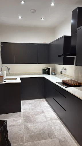 Matte black U-shape kitchen